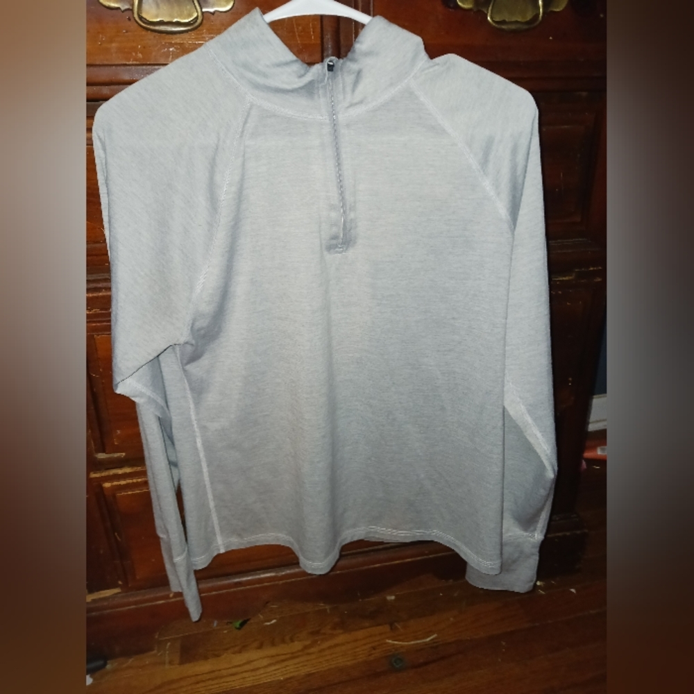White zip up pull over shirt